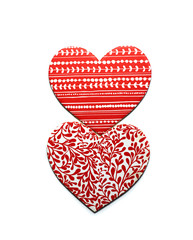 Two red hearts with white pattern isolated on white background. Valentine's day concept.