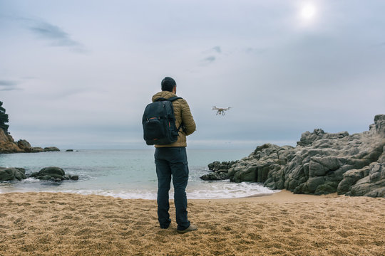 Man  testing its drone and recording videos
