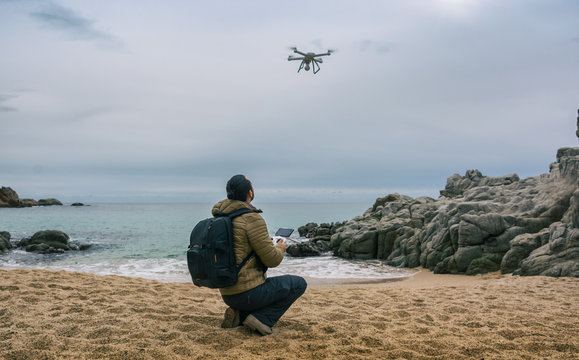 Man  testing its drone and recording videos