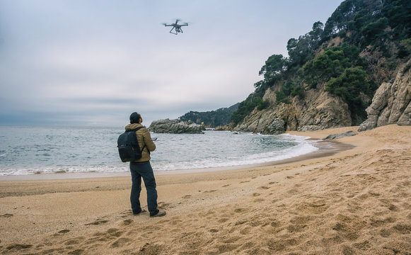 Man  testing its drone and recording videos