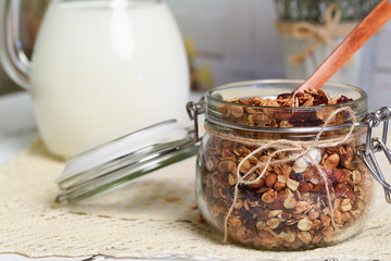 Homemade granola with nuts, cranberries and dried apricots, selective focus, copy space
