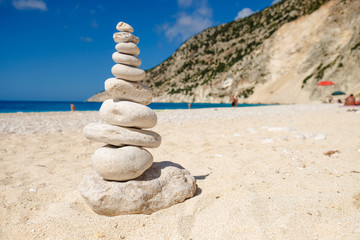 Fototapeta na wymiar Zen stone balancing on a beach in Greece