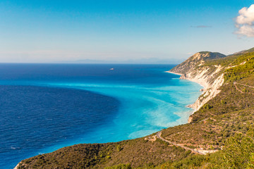 Naklejka na ściany i meble Lefkada Island cliffs and bay Porto Katsiki as seen from above aerial view with clear blue watter