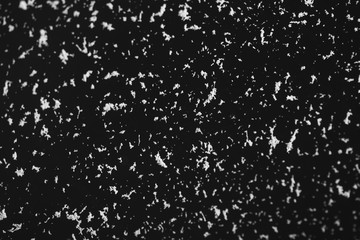 abstract black background with white particles