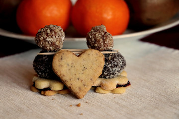 The christmas sweets in form heart and other sweets