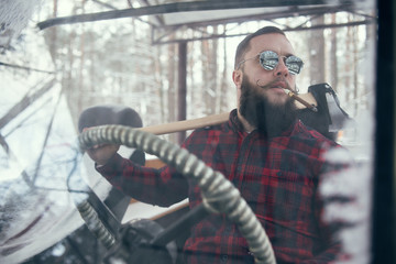 Fototapeta na wymiar Bearded man in car