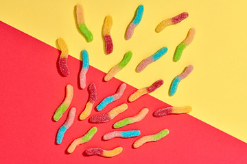 Gummy Candies background, Sweets. Flat lay. Summer Party, Pink Birthday Firework. Bright Colorful Layout. Fun Trendy fashion Style. Minimal. Pop Art