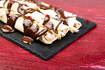 Mexican chicken enchiladas with chili chocolate salsa