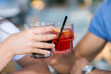 Couple toasting drinks