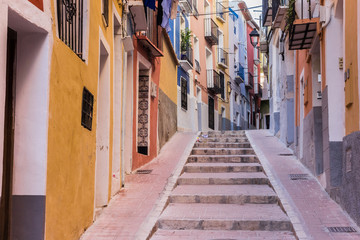 Fototapeta na wymiar Colorful street in the historic center of Villajoyosa