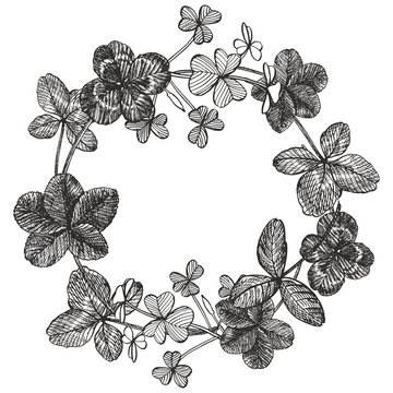 Set of hand drawn clover illustrations isolated on white background. Vector Floral wreath. Graphic round border.