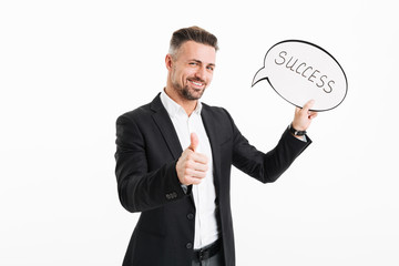 Portrait of a happy mature businessman dressed in suit