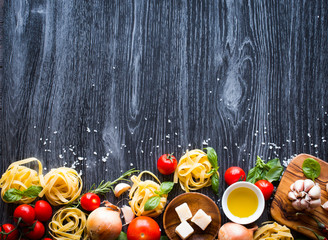Top view of all the necessary food component to make a classic italian pasta