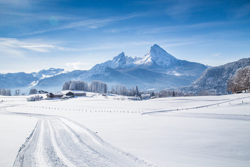 Winter wonderland scenery with mountain peaks in the Alps on a sunny day