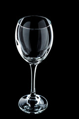 a glass of wine close-up on a black background (isolate).