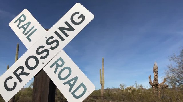 Rail Road Crossing Sign in middle of desert - out back