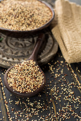 Mix of organic white, yellow and black quinoa, dietary and healthy food