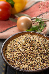 Mix of organic white, yellow and black quinoa, dietary and healthy food