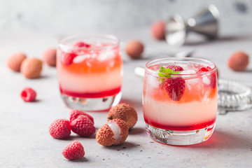 Cold lychee and raspberry cocktail