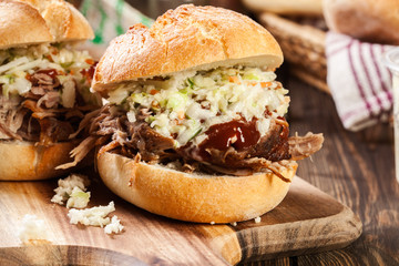 Homemade pulled pork burger with coleslaw salad