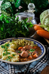 Traditional irish stew served with potatoes and cabbage