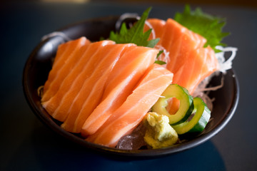 Closeup slice of salmon sashimi