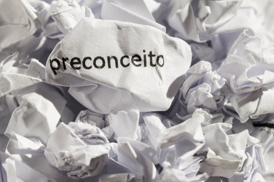 Paper written preconceito, portuguese word for prejudice. Concept of old and abandoned idea or practice.