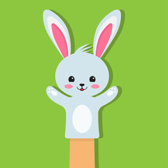 rabbit puppet on a green background