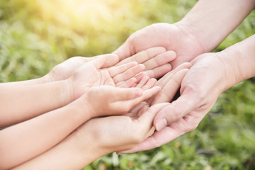 Family hands holding together.