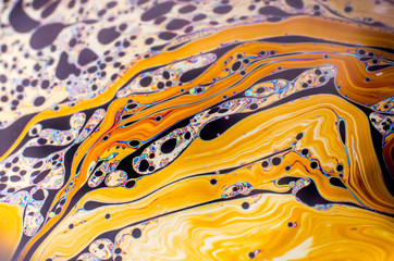 Beautiful psychedelic abstraction formed by light on the surface of a soap bubble