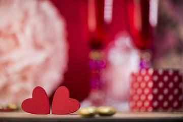 Obraz na płótnie Canvas Happy valentine day hearts on wooden background, greeting card love concept