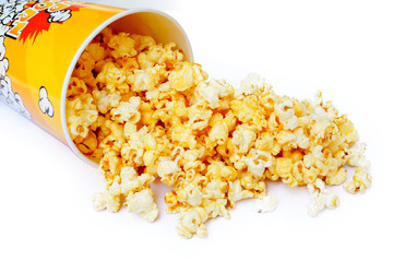 Popcorn in cardboard box isolated on white background