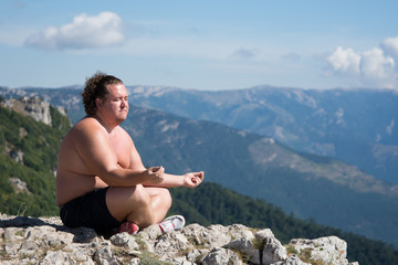 The man on top of the mountain. Relax and relax. 