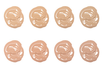 Shades of liquid fluid foundation swatches isolated on white