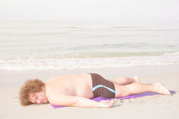 Fototapeta premium Lazy man on the sea. Vacation. 