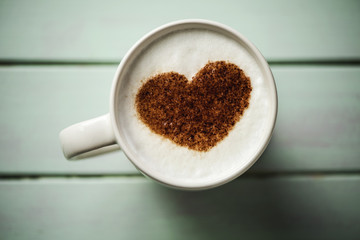 cup of cappuccino with a heart