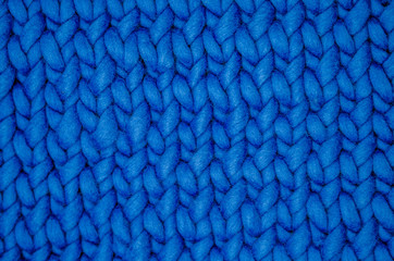 A pattern of facial loops on a plaited of merino yarn.
