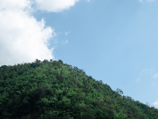 Obraz premium LandScape, Green Fresh Nature Background of Forest Mountains and Sky, Countryside of Thailand.