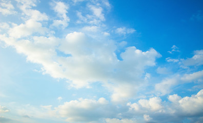 Naklejka na ściany i meble World environment day concept: Blue sky and white clouds with sun light skyline background