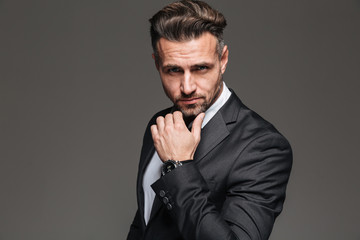 Portrait of a confident mature businessman dressed in suit