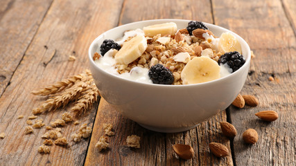 bowl of muesli and fruit - Powered by Adobe