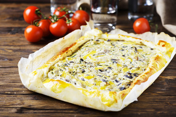 Homemade vegetarian tart with ricotta, paprika and zucchini