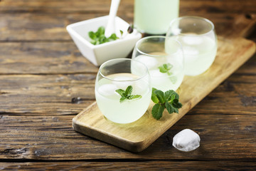 Summer cocktail with rum, ice and mint