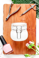 salt and cream for nail care in spa top view