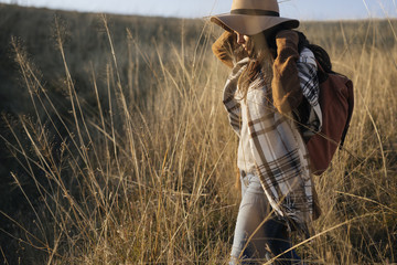 Fototapeta premium Woman Trekking in The Field