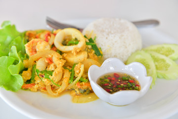 Stir fried squid with curry.