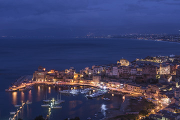 Fototapeta na wymiar Marina di Castellammare del Golfo al calar della sera, Sicilia