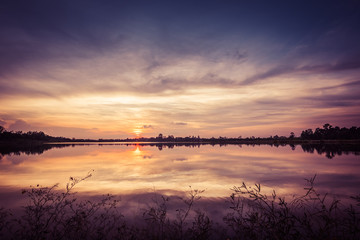 Fototapeta na wymiar Sunset at the lake landscape