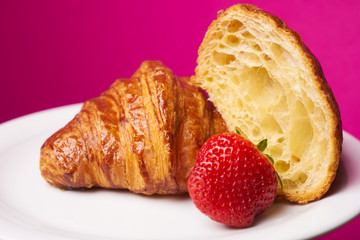 Plate of freshly baked French croissants