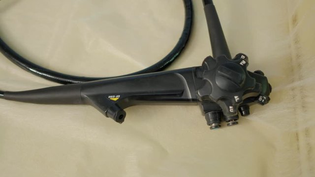 Gastroscopy device in a medical room
